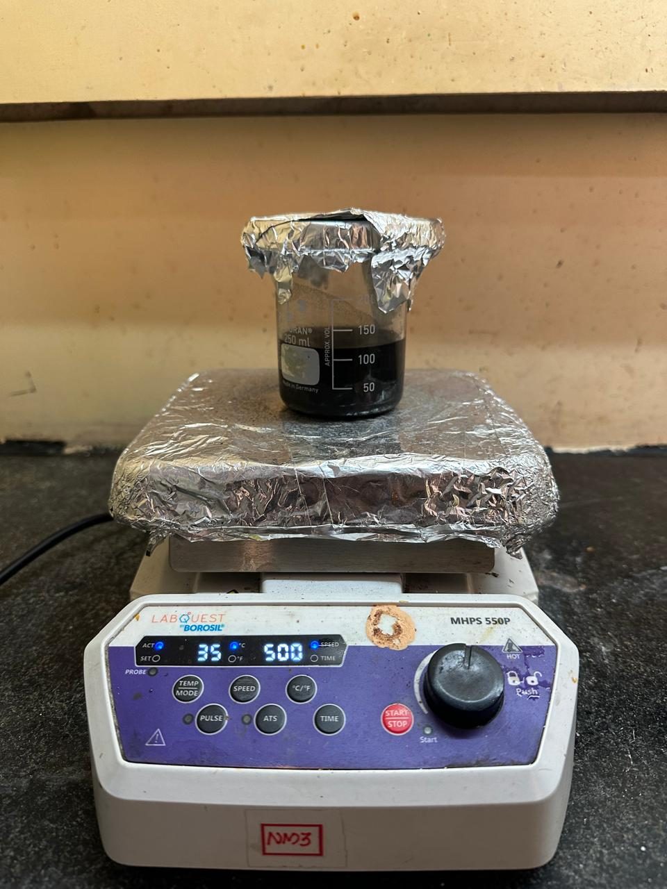 Stirring the composite mixture on a hotplate stirrer