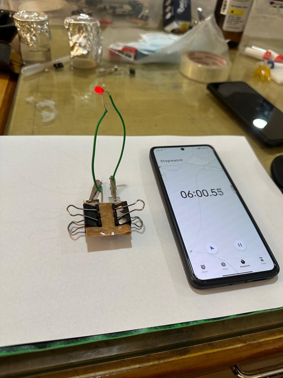 A single cell lighting an LED — timed discharge