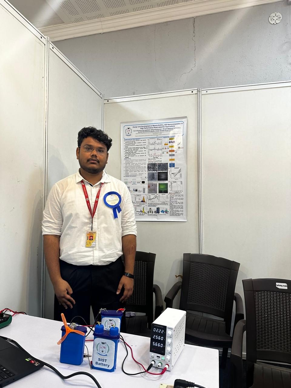 Demo booth — prototype battery and poster